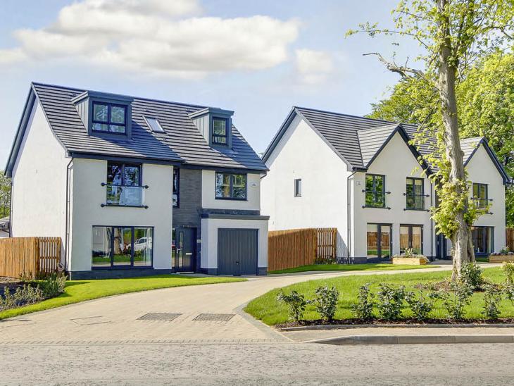 Two of our beautiful detached Robertson Homes, surrounded by green space.