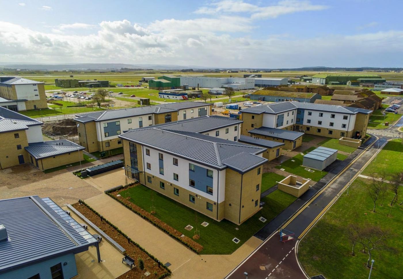Aerial picture of residential blocks at RAF Lossiemouth with blue sky