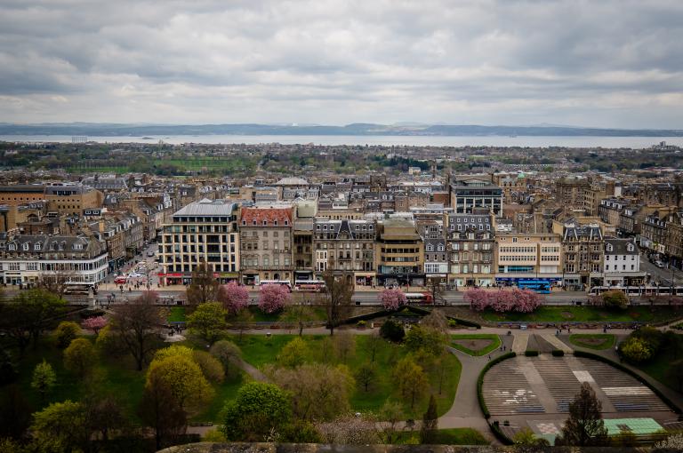 An aerial view of Princes Street in Edinburgh during the day.