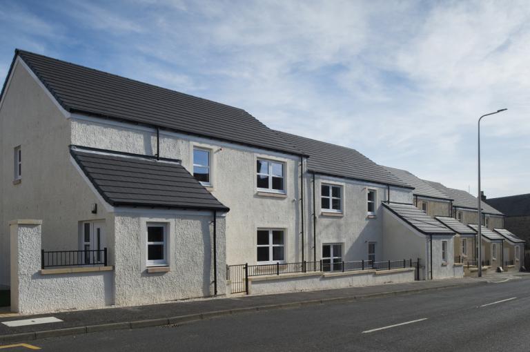 Row of new house with white render