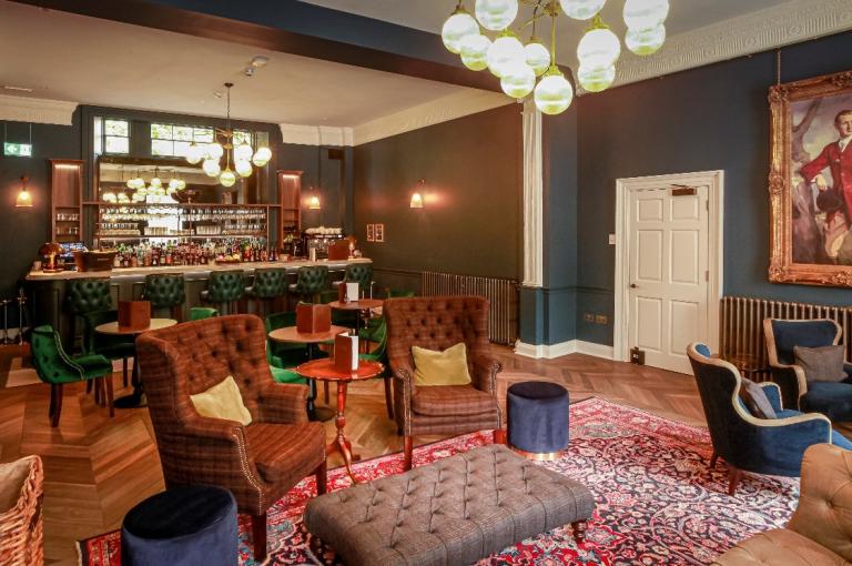 Lounge area with seating and bar