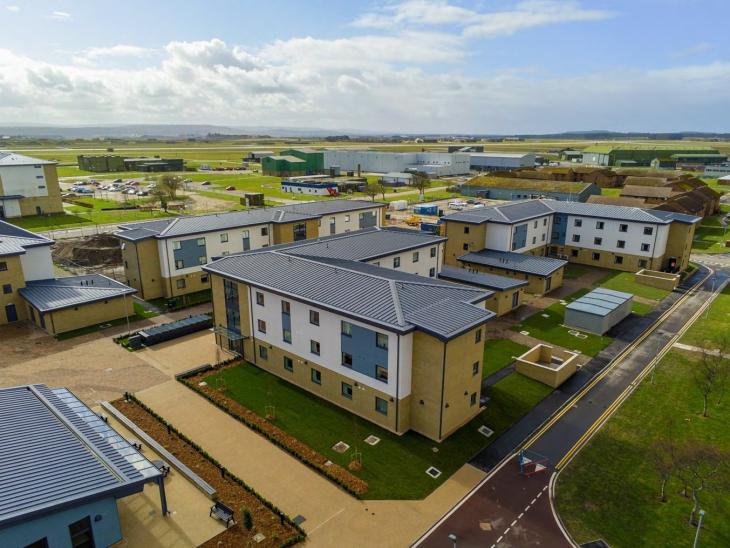 Aerial picture of residential blocks at RAF Lossiemouth with blue sky