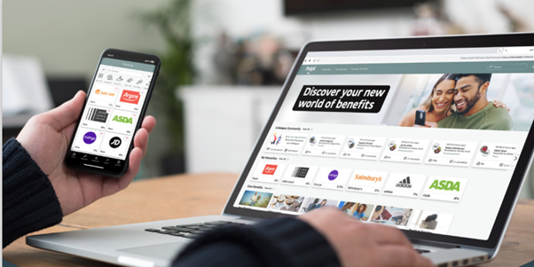 Man accessing Robertson employee benefits on desktop and mobile