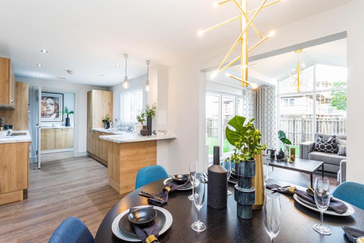 Image of modern new home interior with open plan kitchen and conservatory