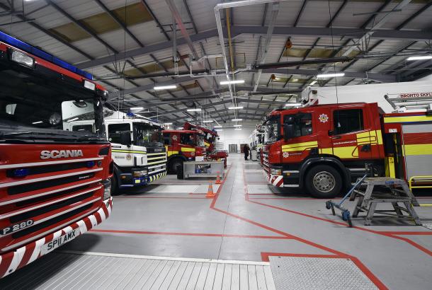 Three fire appliances inside Scottish Fire & Rescue Service's Dundee Asset Resource Centre. 