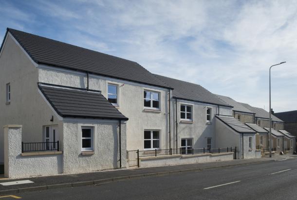 Row of new house with white render