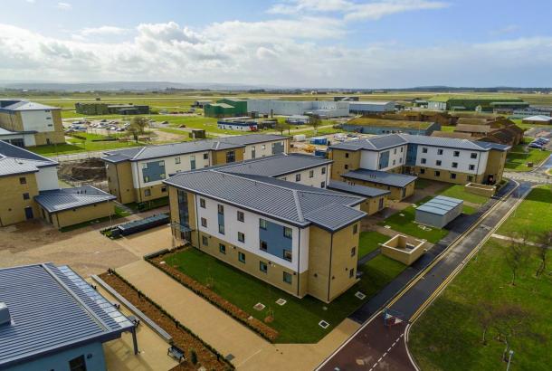 Aerial picture of residential blocks at RAF Lossiemouth with blue sky