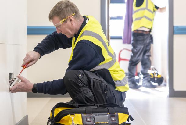 Robertson Facilities Management operatives performing hard FM maintenance in a local authority facility