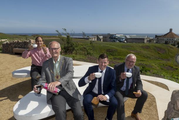 People in Aberdeen toasting a cup of tea to the opening of Broadhill, part of the Aberdeen Beacfront Masterplan that Robertson Group is delivering