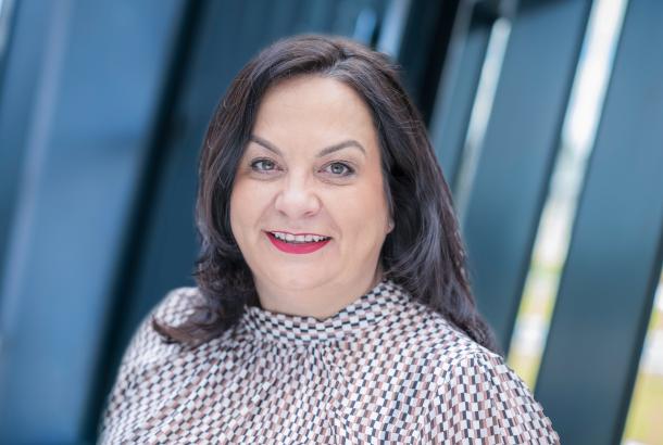 Headshot of business woman with patterned dress