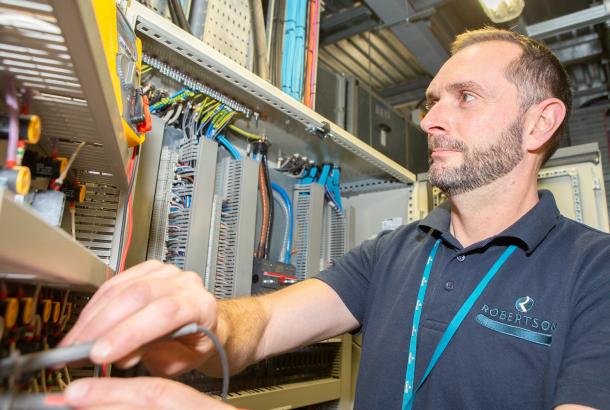 Hard FM services professional performing electrical maintenance