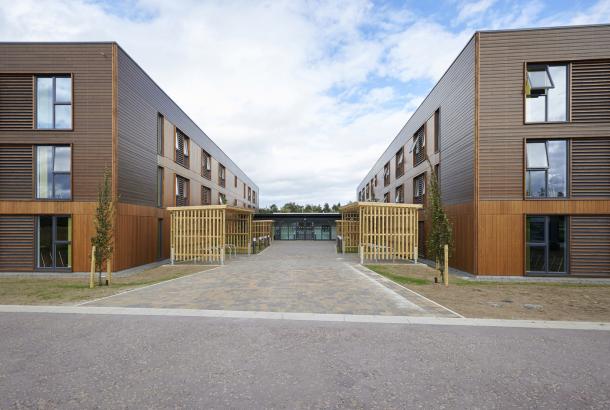 Two student accommodation blocks with a path in between