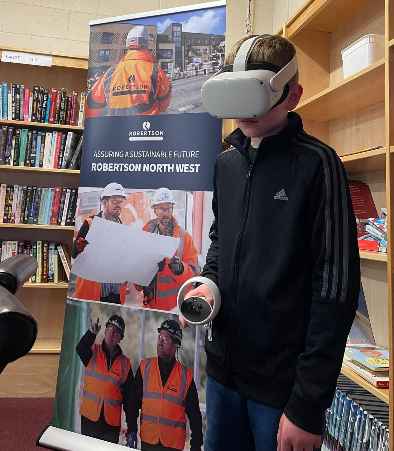 A school boy wearing a VR headset