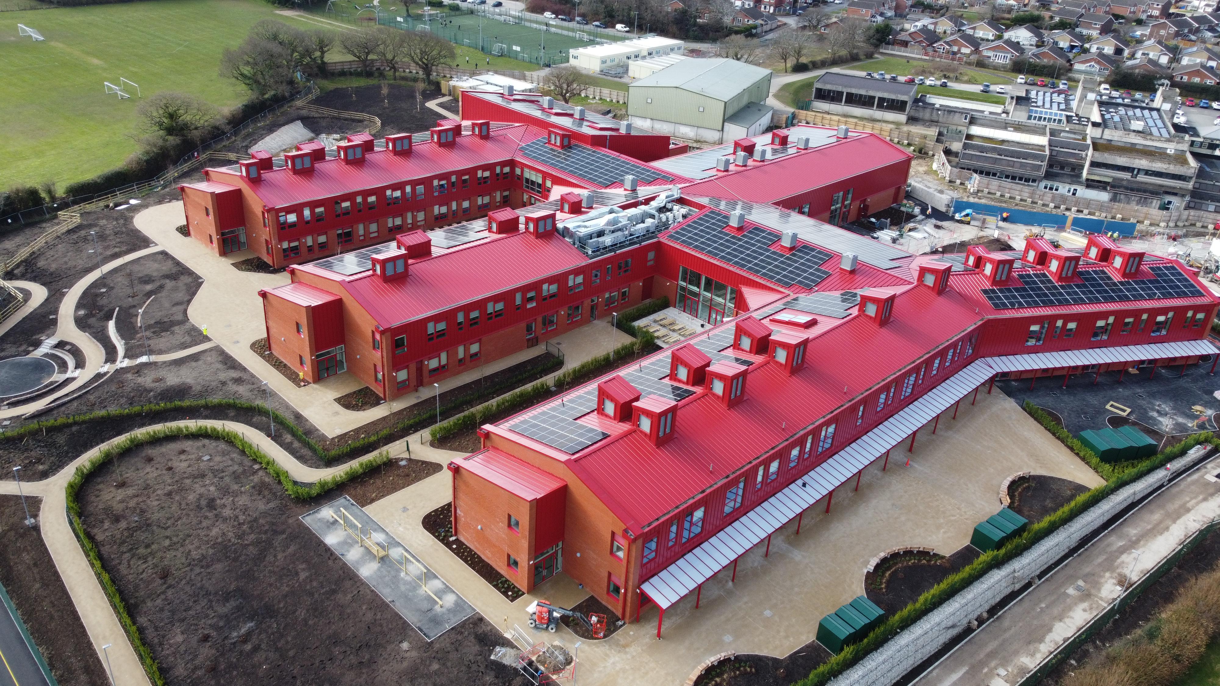 Aerial photo of Mynydd Isa School with red roof