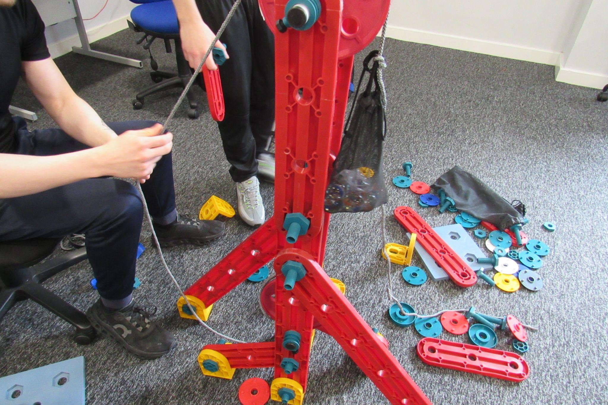 Individuals at HMP Addiewell taking part in a Robertson Group construction activity