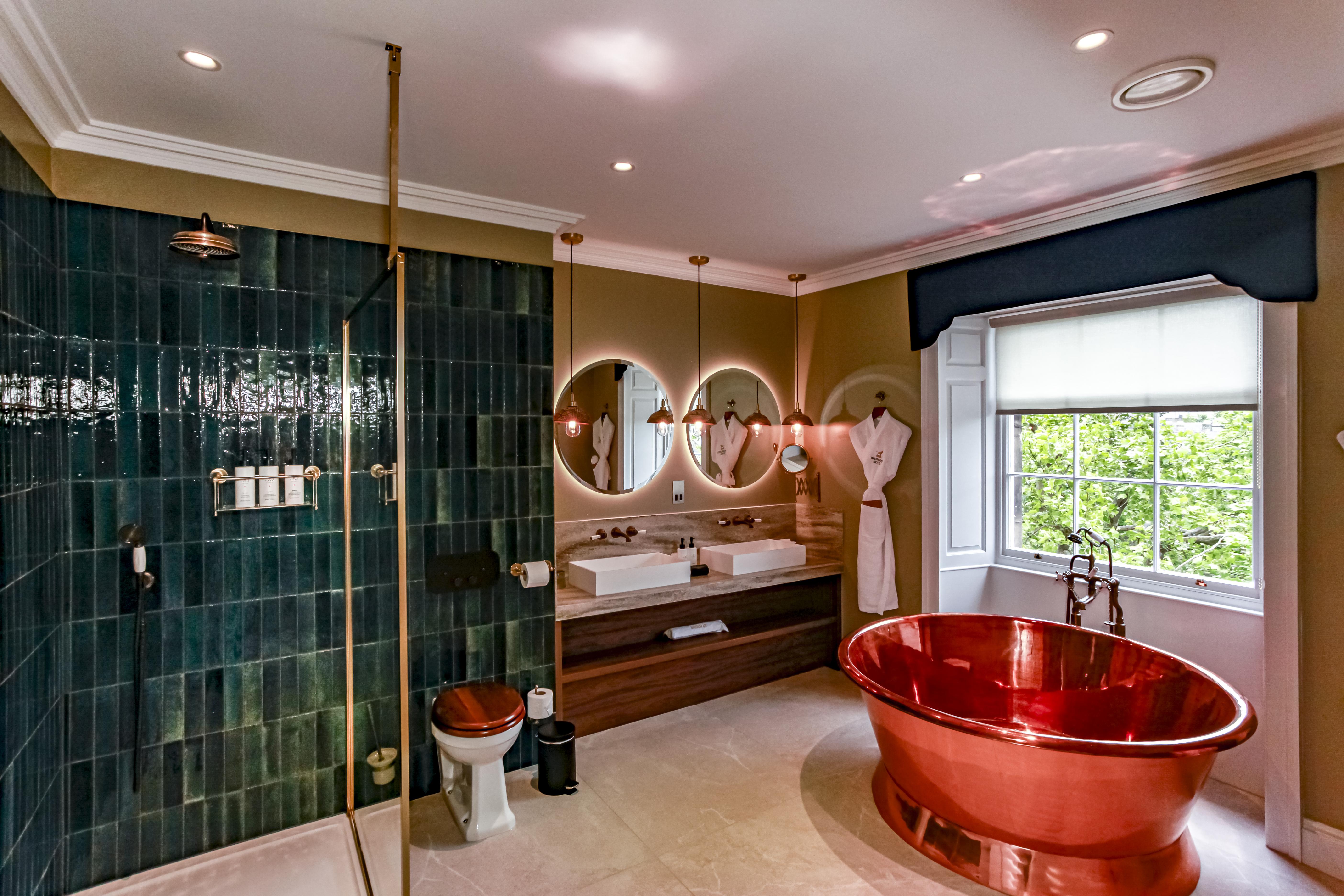 copper feature bath in luxury hotel bathroom