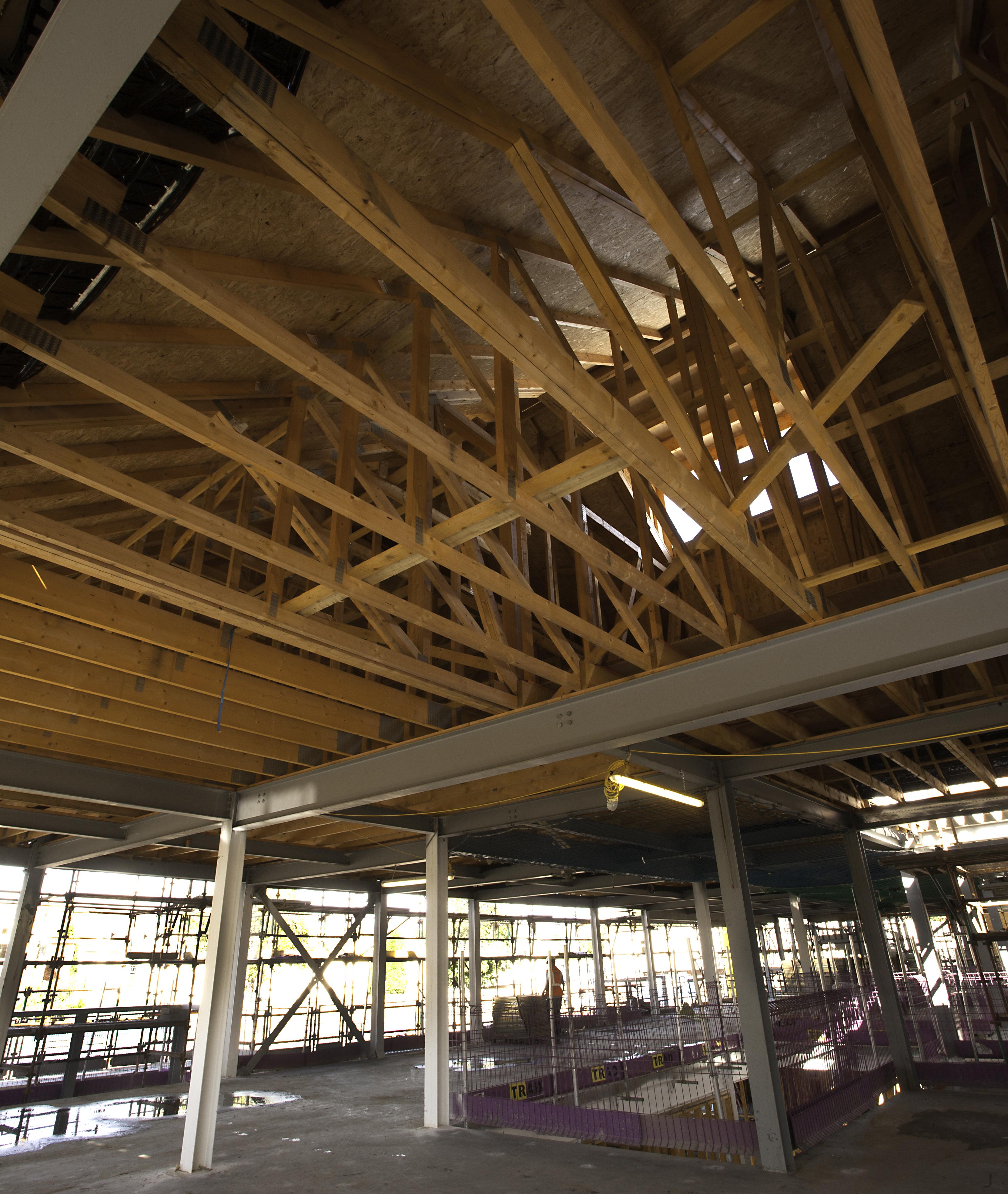 Timber frame roof trusses at hospital under construction