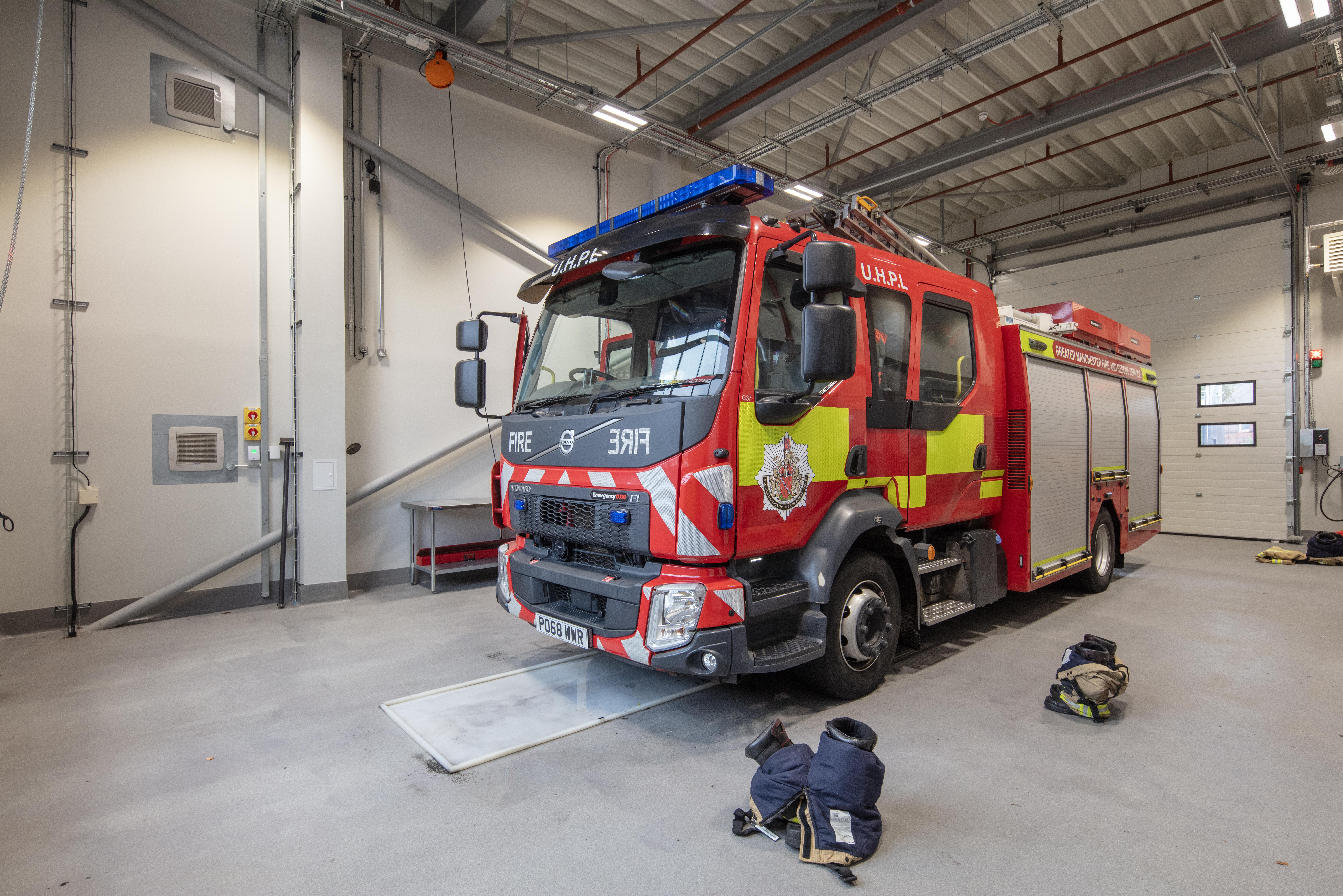 Fire station interior with fire engine