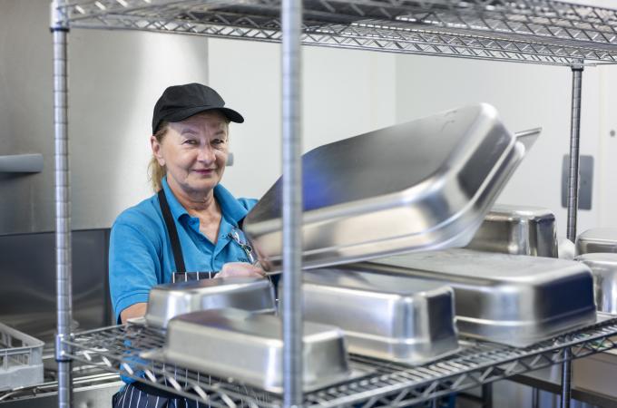 Employee in facilities management catering job