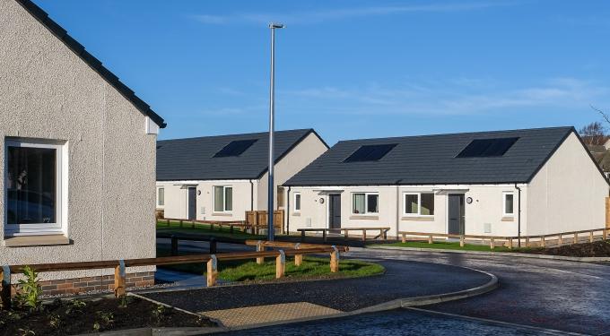 Energy-efficient bungalow with blue skies at the Pitcorthie development in Dunfermline, delivered by Robertson Construction for Fife Council