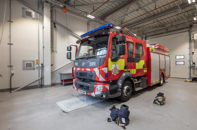 Fire station interior with fire engine