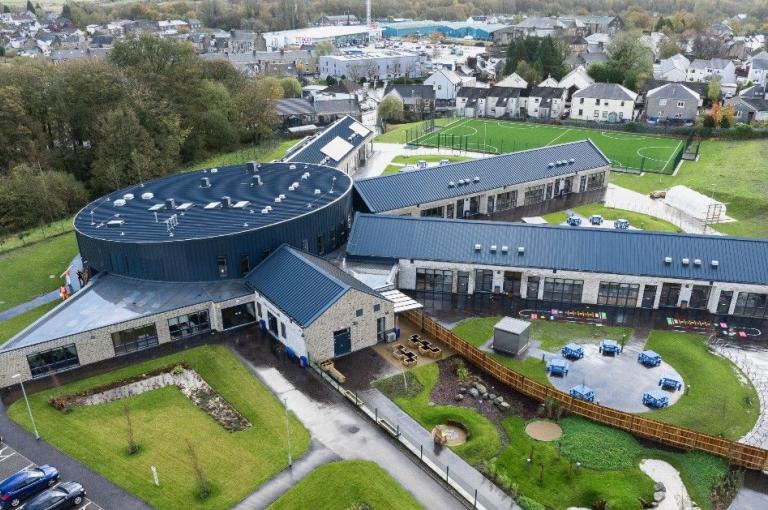 Aerial view of school with several wings