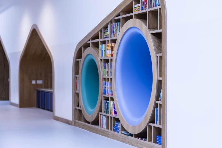 Book nook built into wall with integrated seating