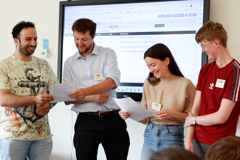 Summer interns giving a presentation.