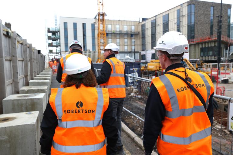 Trainee on Robertson construction site.