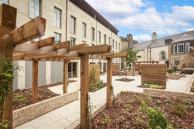 Courtyard and pergola of historic refurbished Bailiffgate Boutique Hotel, Northumberland