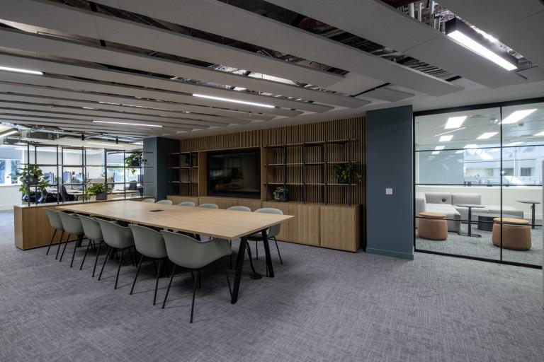 Image of office space with TV and desk