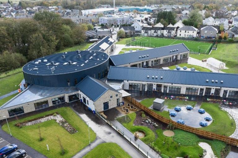 Aerial view of school with several wings