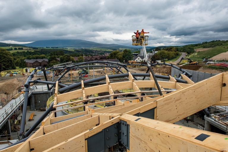 The complex geometry and timber engineering of the roof at The Macallan - image by Steve Mcurry