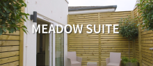 Garden patio with plants and text overlay reading 'Meadow Suite'