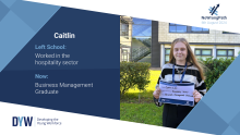 Caitlin holding No Wrong Path sign 2024