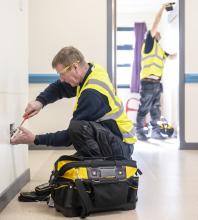 Robertson Facilities Management operatives performing hard FM maintenance in a local authority facility