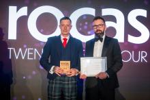 Robertson employee of the year receiving award