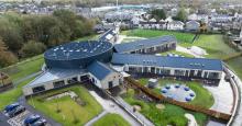 Aerial view of school with several wings
