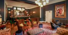 Lounge area with seating and bar
