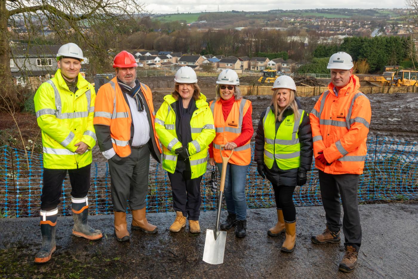 Representatives from Robertson, Kirklees Council, Housing 21 and Homes England at a ground-breaking event for an extra care scheme development in Cleckheaton, Kirklees
