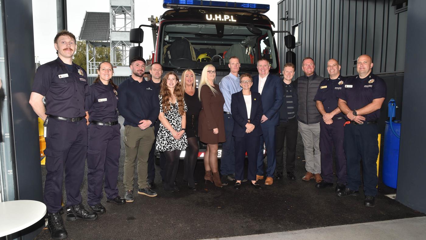 Robertson team with firefighters and Mayor of Greater Manchester