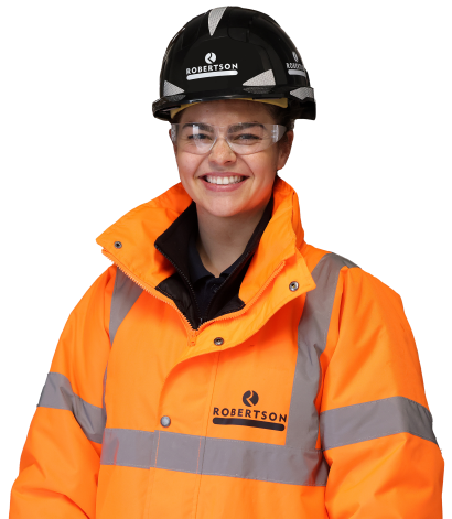 Woman in construction career with Robertson Group orange high vis jacket and black hard hat